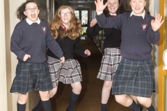 POST PRIMARY STUDENTS JUMPING FOR JOY
